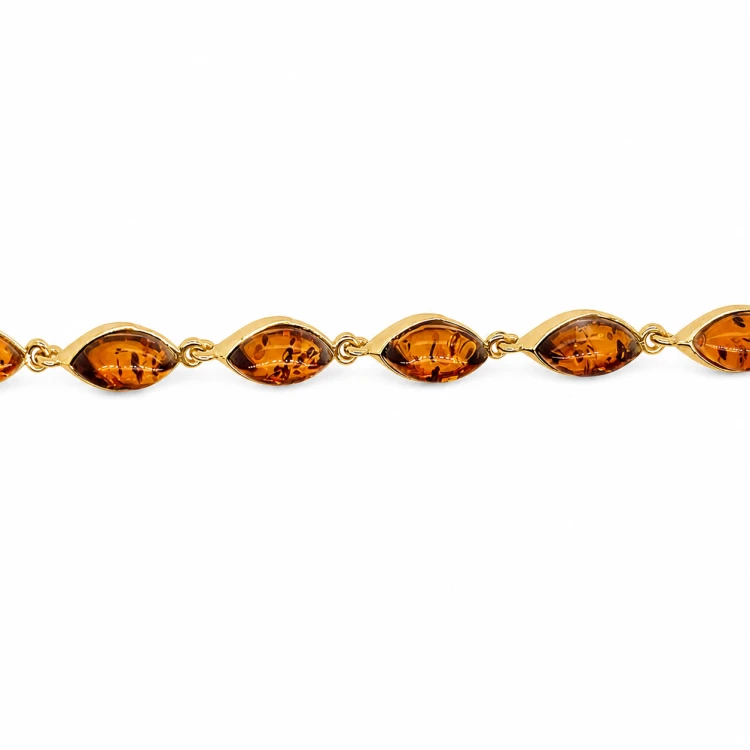 Vergoldeter Schmuck mit Bernstein