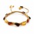 Armband aus Bernstein an einer Schnur