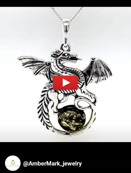 Eleganter Silberdrache mit bernsteinfarbenem Stein