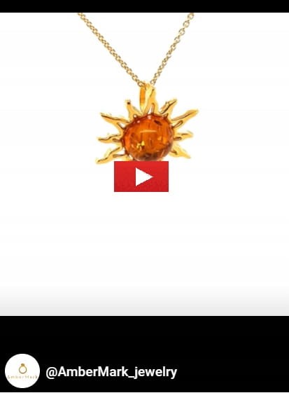 bernstein schmuck sonne anhänger detail