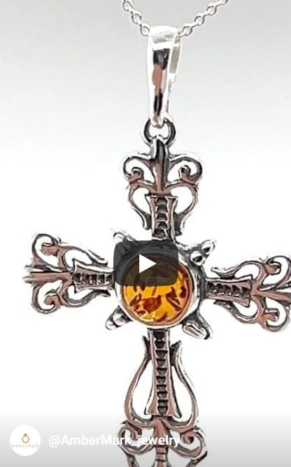 Handgefertigtes Silberkreuz mit Bernstein