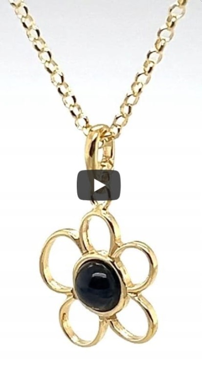 Silberner vergoldeter Anhänger mit Onyx Blume